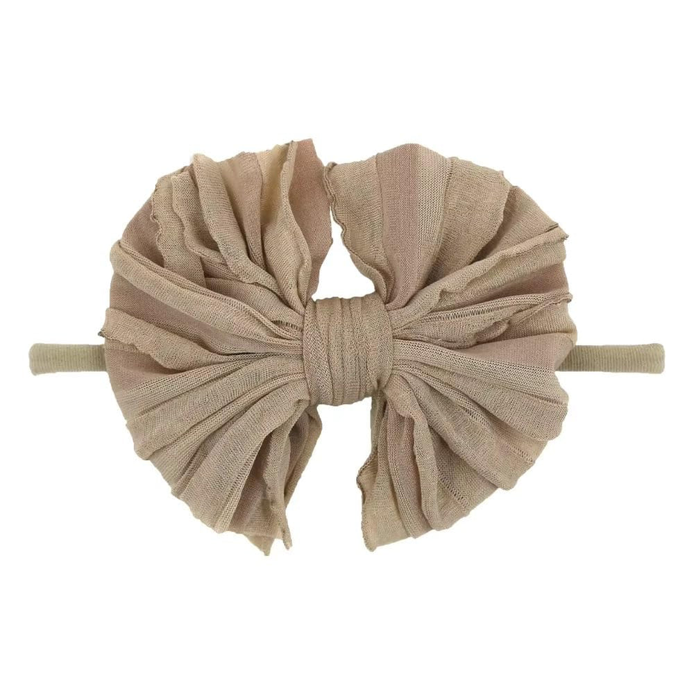 NUOSYI yellow headband adds cheerful color to outfits.