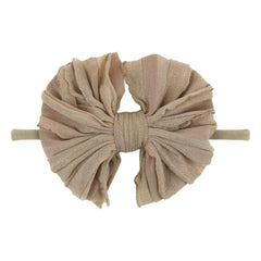 NUOSYI yellow headband adds cheerful color to outfits.