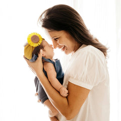 NUOSYI flower accents headband with sunflower detail, ideal for photo sessions.