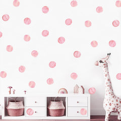 NUOYOAH rainbow polka dot decals add color to playrooms and can be repositioned.