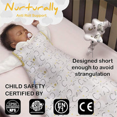 Nurturally crib elastic system demonstrates side-to-side tension for gentle support.