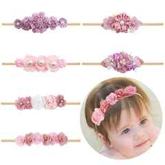 NUWAJP baby flower headband in pastel pink for newborn photos and everyday outfits.
