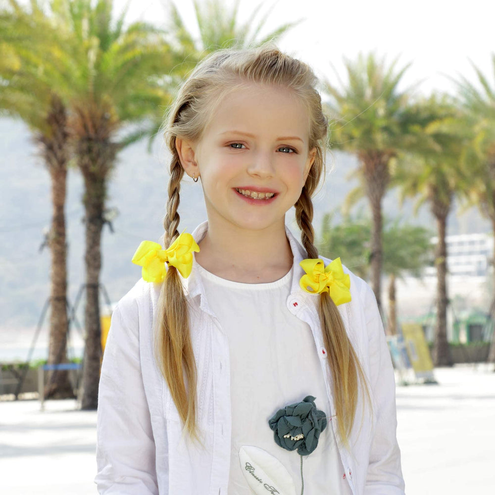 OAOLEER 3-inch bow worn in a ponytail for versatile styling.