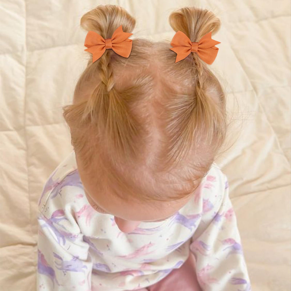 OAOLEER tiny bows alligator clip pack, secure hold for toddlers.