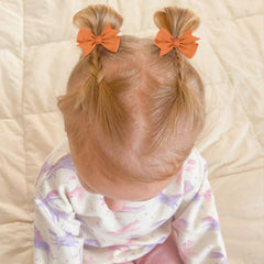 OAOLEER tiny bows alligator clip pack, secure hold for toddlers.