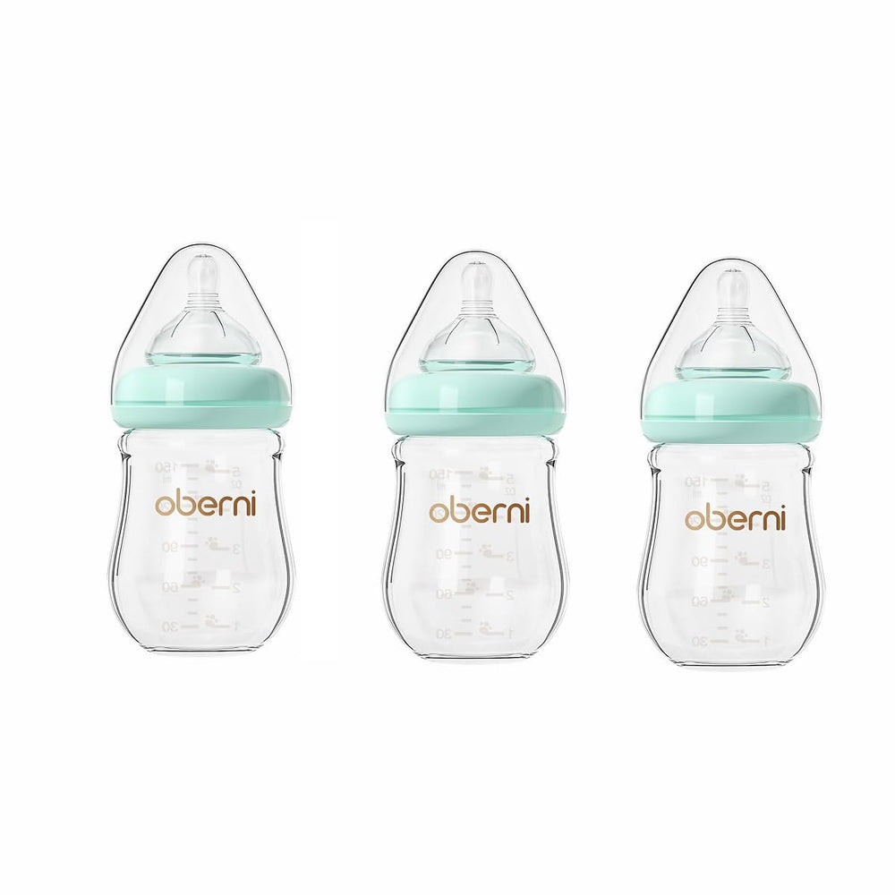 Oberni glass baby bottle in blue with 5oz capacity and 3-pack design for easy daytime feeds.