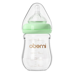 Oberni glass baby bottle green front view showing clear borosilicate glass