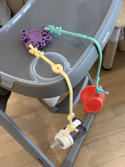 Octopal baby tether kit helps keep toys within reach and off the floor.