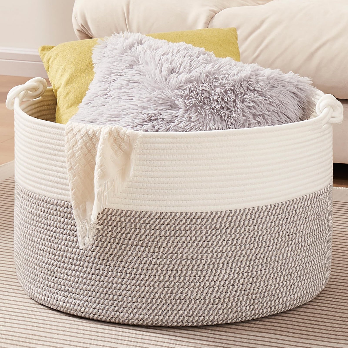 OIASKET large blanket storage basket showing ample space for bulky items like pillows and throws