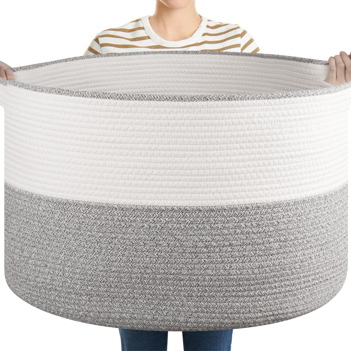 OIASKET XXL blanket basket with handles keeps throws organized in the living room.