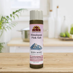 OKAY Himalayan Pink Salt Body Wash closeup highlights minerals for healthy-looking skin.