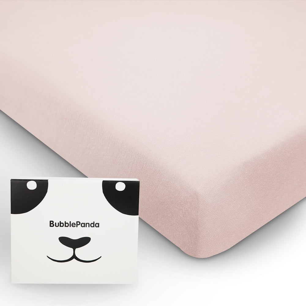 BubblePanda crib sheet in soft pink close-up showing gentle softness for baby sleep