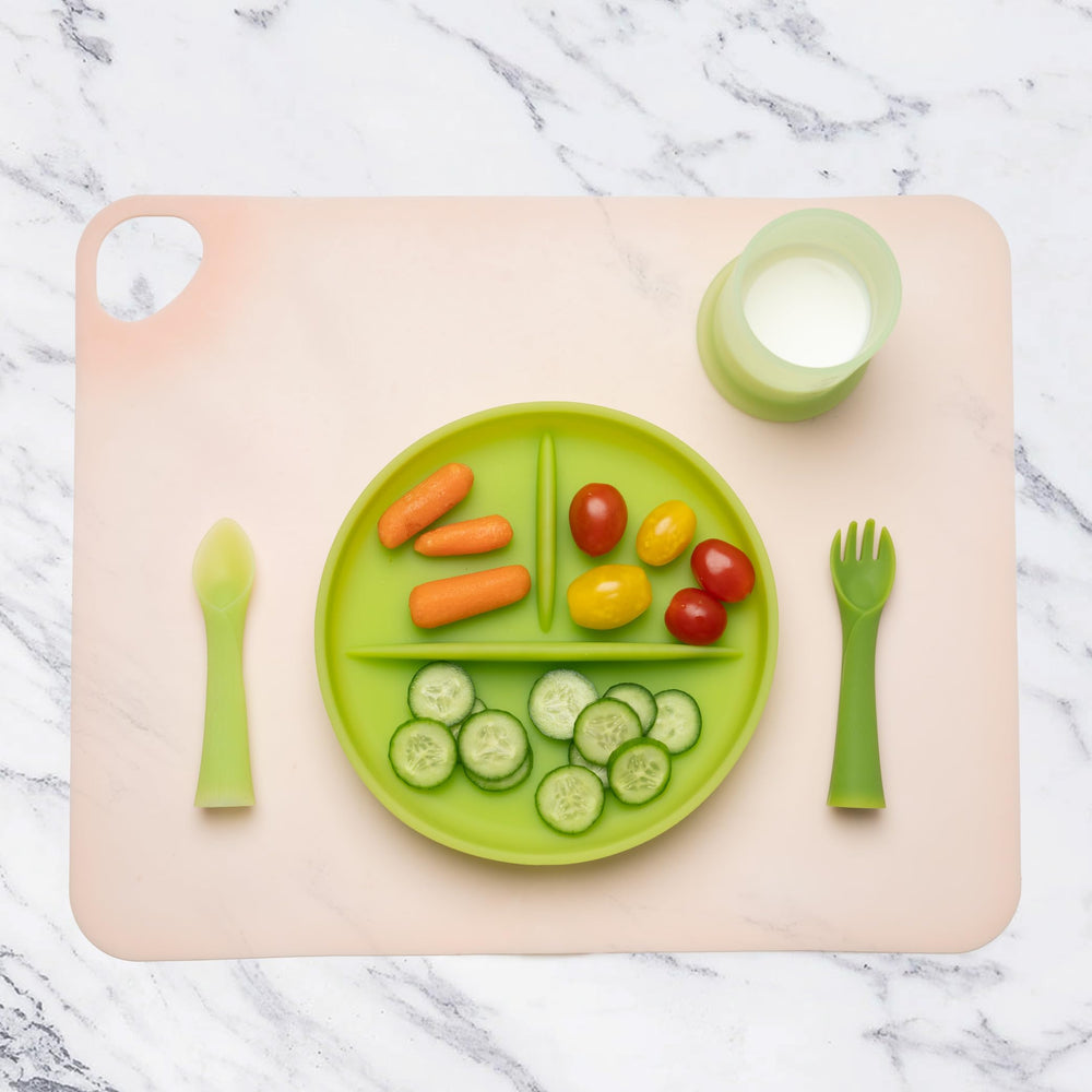Olababy Fold N Go 15x12 inch placemat on a toddler table