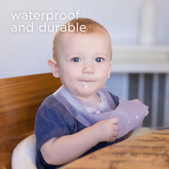 Olababy Fold N Go travel case with lilac bib kept neatly for trips.