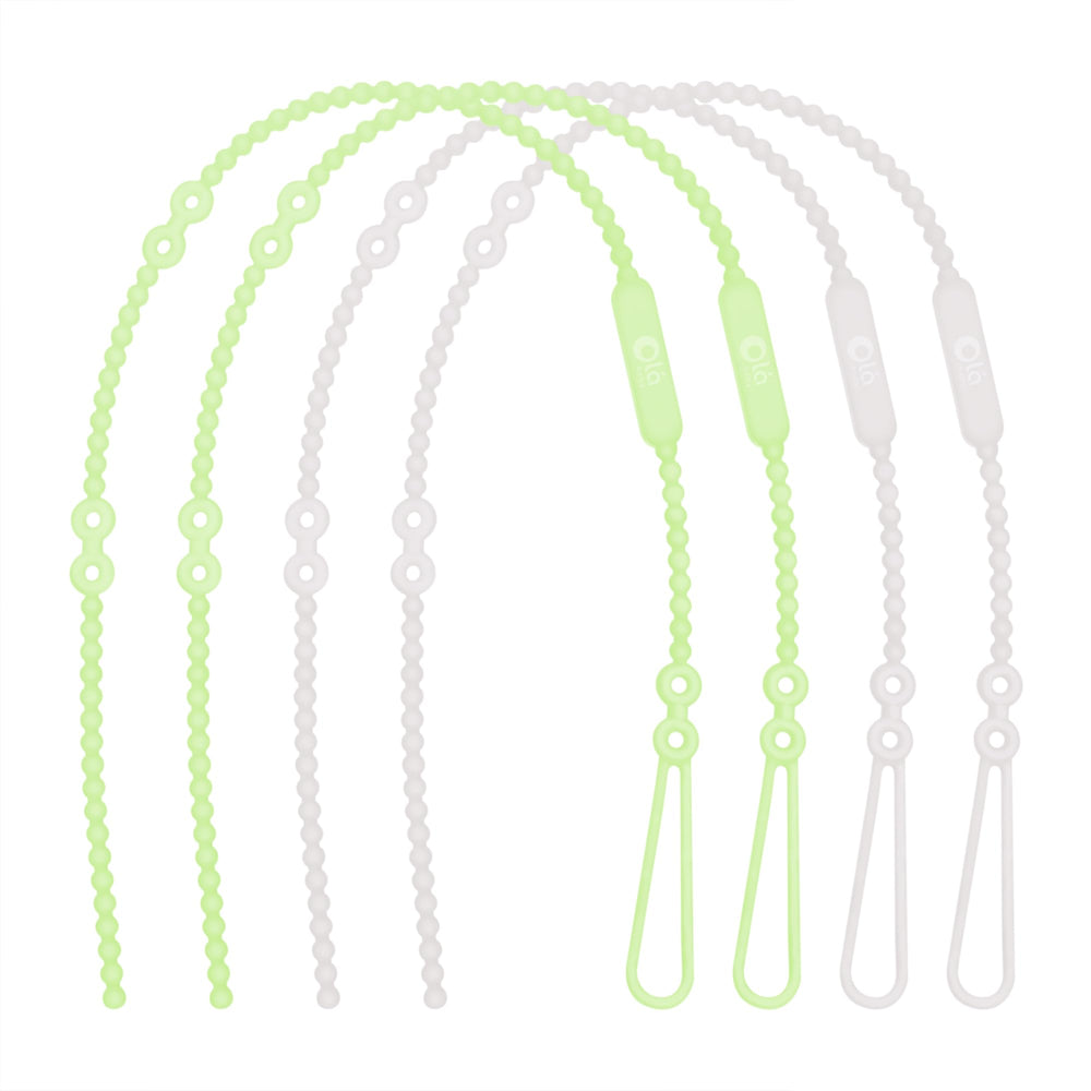 Olababy silicone strap securing a teether for easy reach during playtime