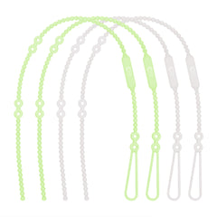 Olababy silicone strap securing a teether for easy reach during playtime