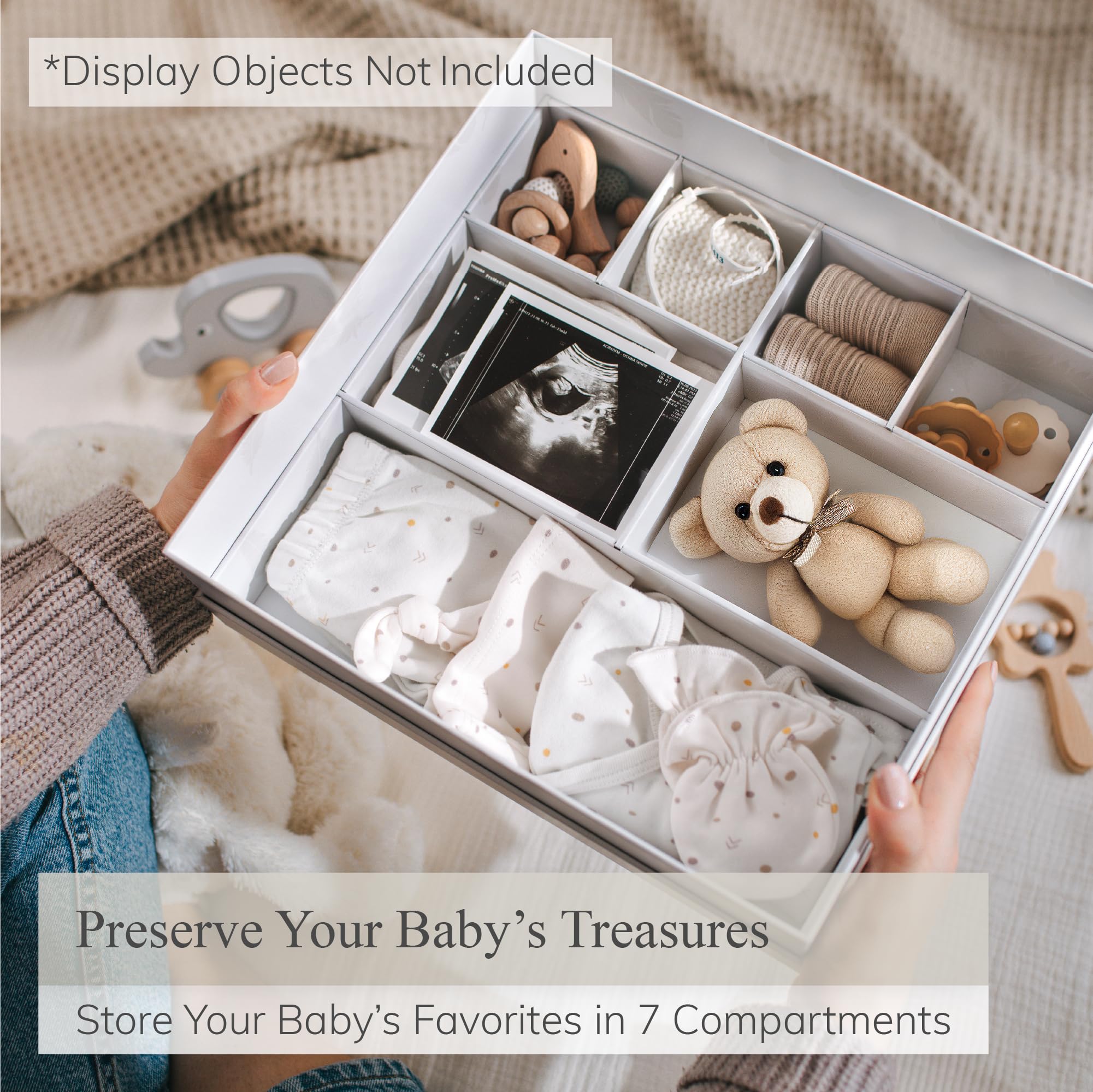 Olive & Lark keepsake box drawers for organizing first-year mementos.