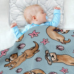 Ollabaky Otters blanket folded compactly for travel.