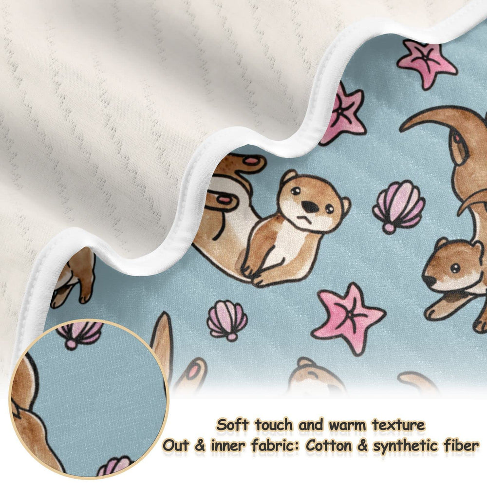 Ollabaky Otters blanket in a crib setup for soothing sleep.