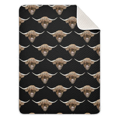 Ollabaky Scottish Highland Cow Head baby blanket on crib for cozy nights.