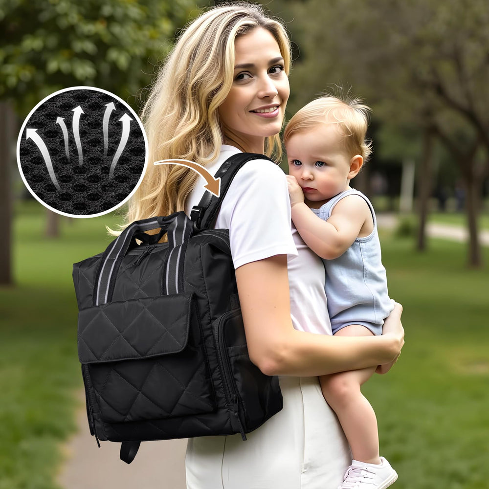 Omanmoli black quilted diaper bag backpack combines chic look with practical storage.