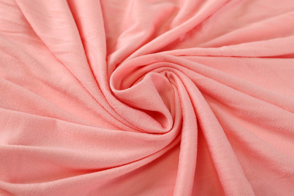 Onacosht elastic-edge bassinet sheet keeps a snug, wrinkle-free fit