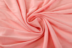 Onacosht elastic-edge bassinet sheet keeps a snug, wrinkle-free fit