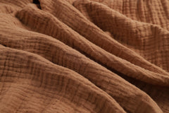 Onacosht muslin bassinet sheet elastic edge provides snug, wrinkle-free fit.