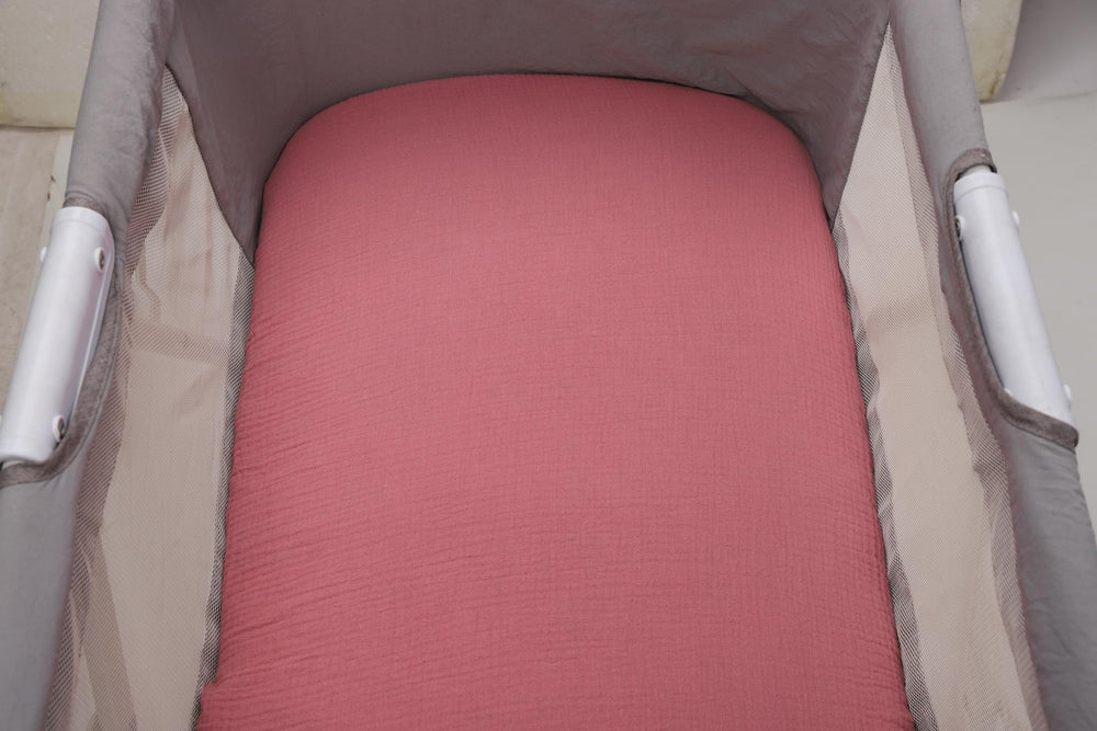 Onacosht deep pockets ensure snug bassinet mattress fit.