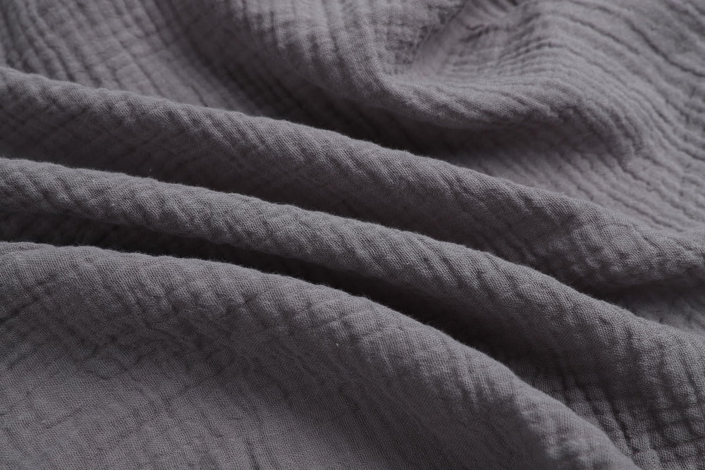 Onacosht muslin bassinet sheets in grey with soft texture and clean look.
