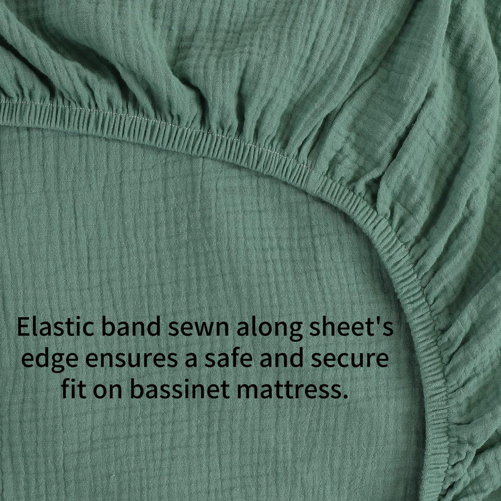 Elastic edge and deep pockets securing Onacosht bassinet sheets