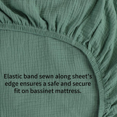 Elastic edge and deep pockets securing Onacosht bassinet sheets