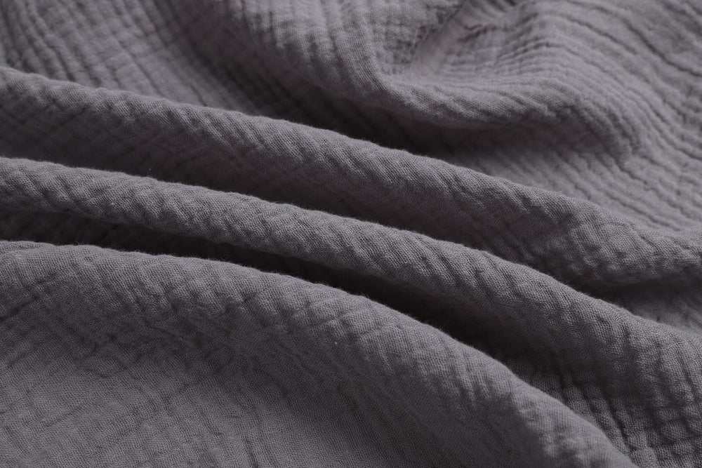 Pre-washed softness of Onacosht muslin bassinet sheets for gentle sleep