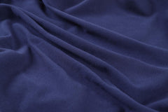 Onacosht organic cotton jersey-knit sheets feel soft against baby's skin.
