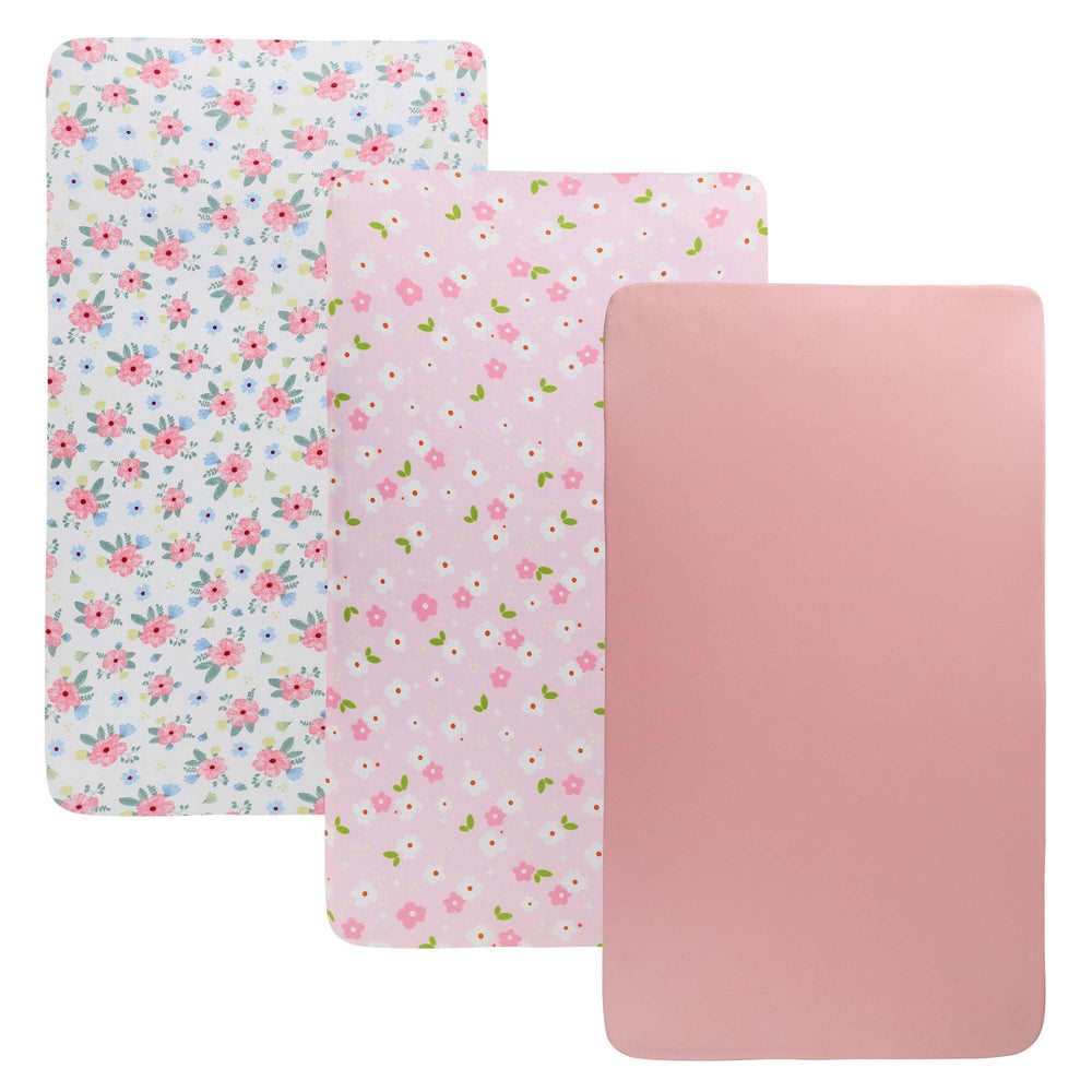 Onacosht stretchy bassinet sheets in pink floral fit securely for peaceful naps