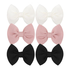 ONENINEDREAM baby bow clip in black with a secure alligator clip for daily wear.