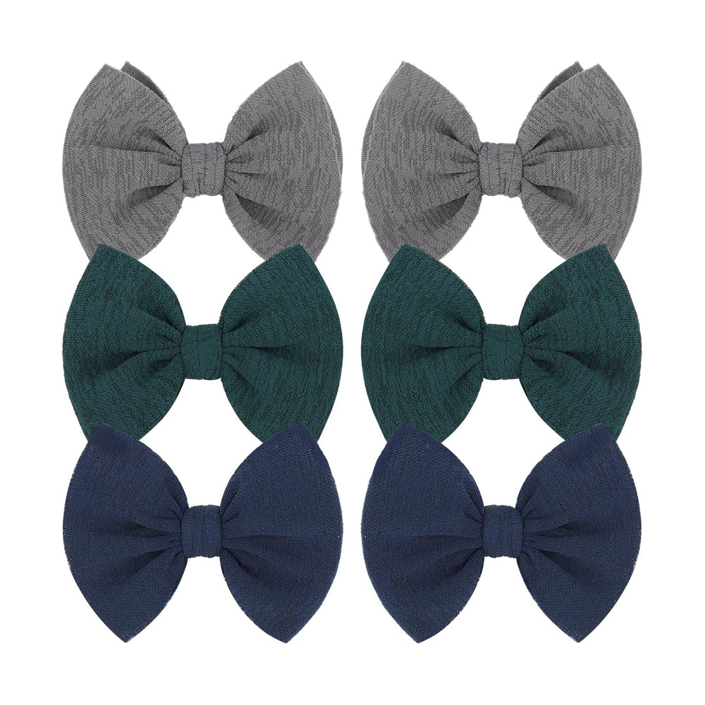 ONENINEDREAM navy bow clip adds a versatile daily accent with secure grip.