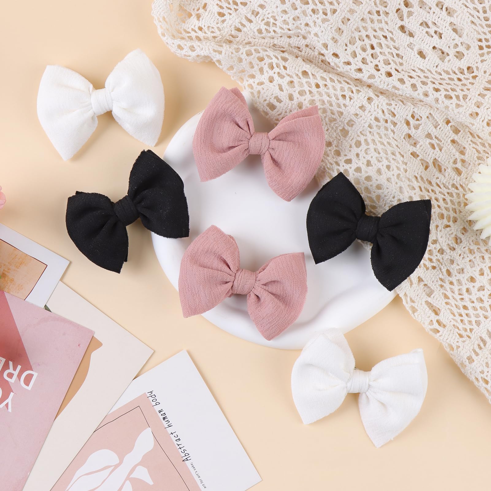 ONENINEDREAM baby bows clipped on toddler hair for playful looks.