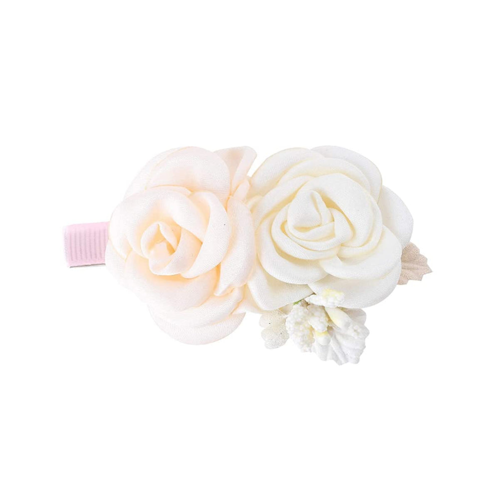 OOSAKU floral clip complements party or wedding outfits.