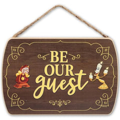 Open Road Brands Be Our Guest wood wall decor enhances entryways with classic Disney charm.