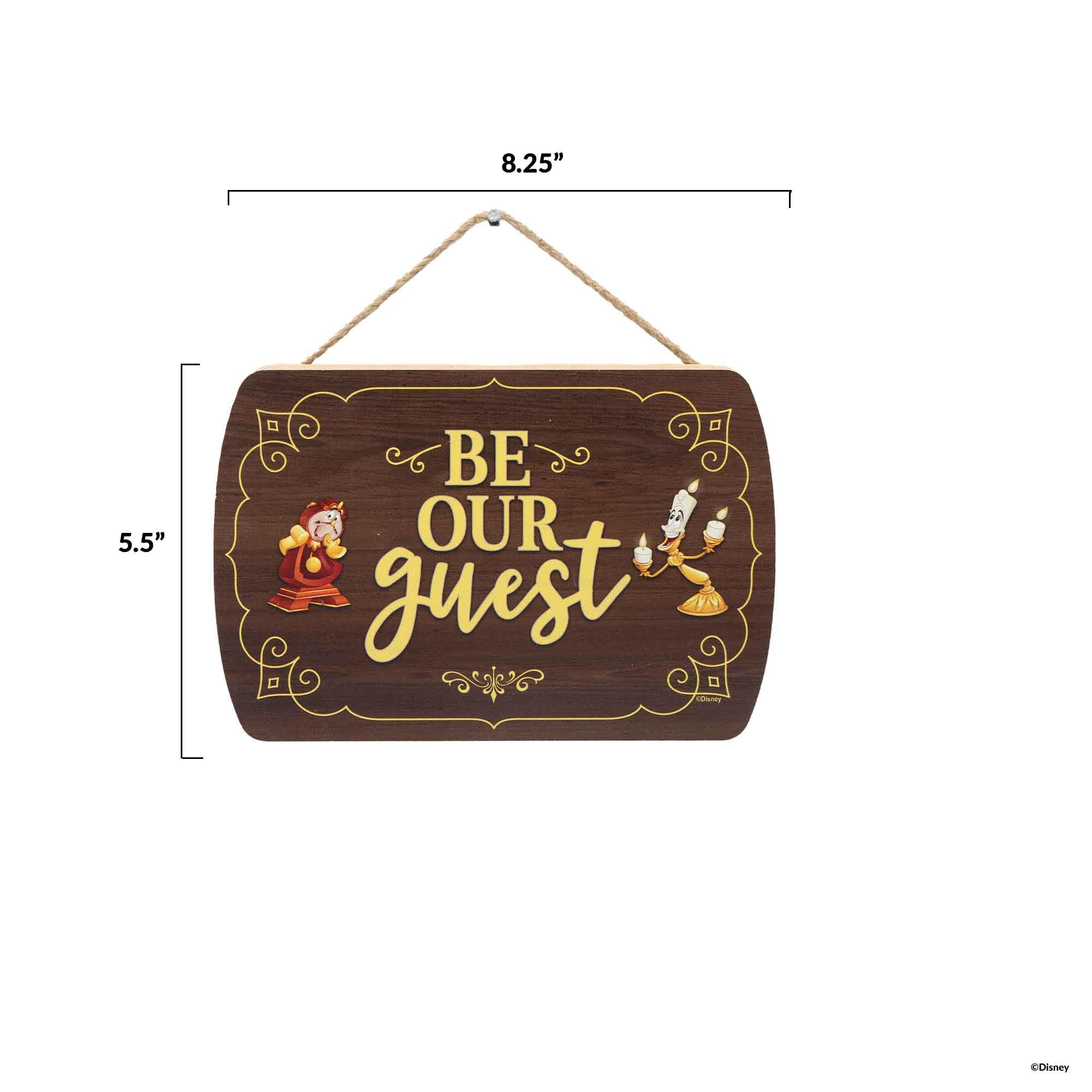 Entryway or guest room display with Be Our Guest sign adds Disney-inspired warmth.