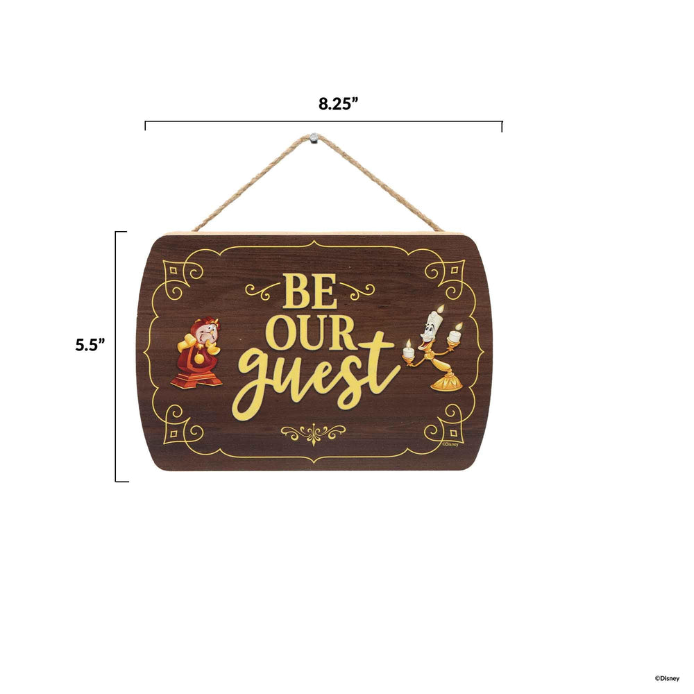 Entryway or guest room display with Be Our Guest sign adds Disney-inspired warmth.