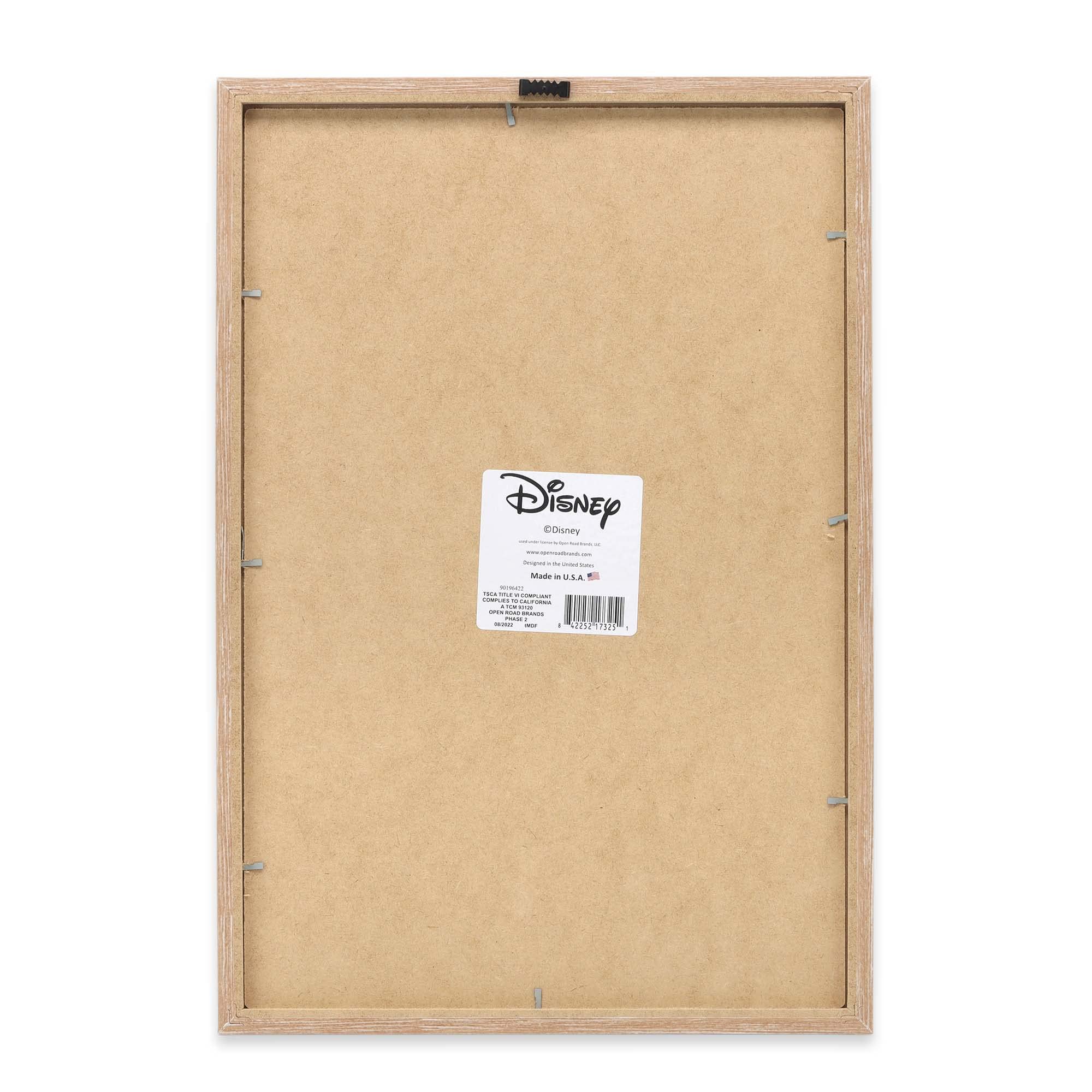 Open Road Brands framed wood wall art Dumbo emphasizes warm, natural tone for nursery styling