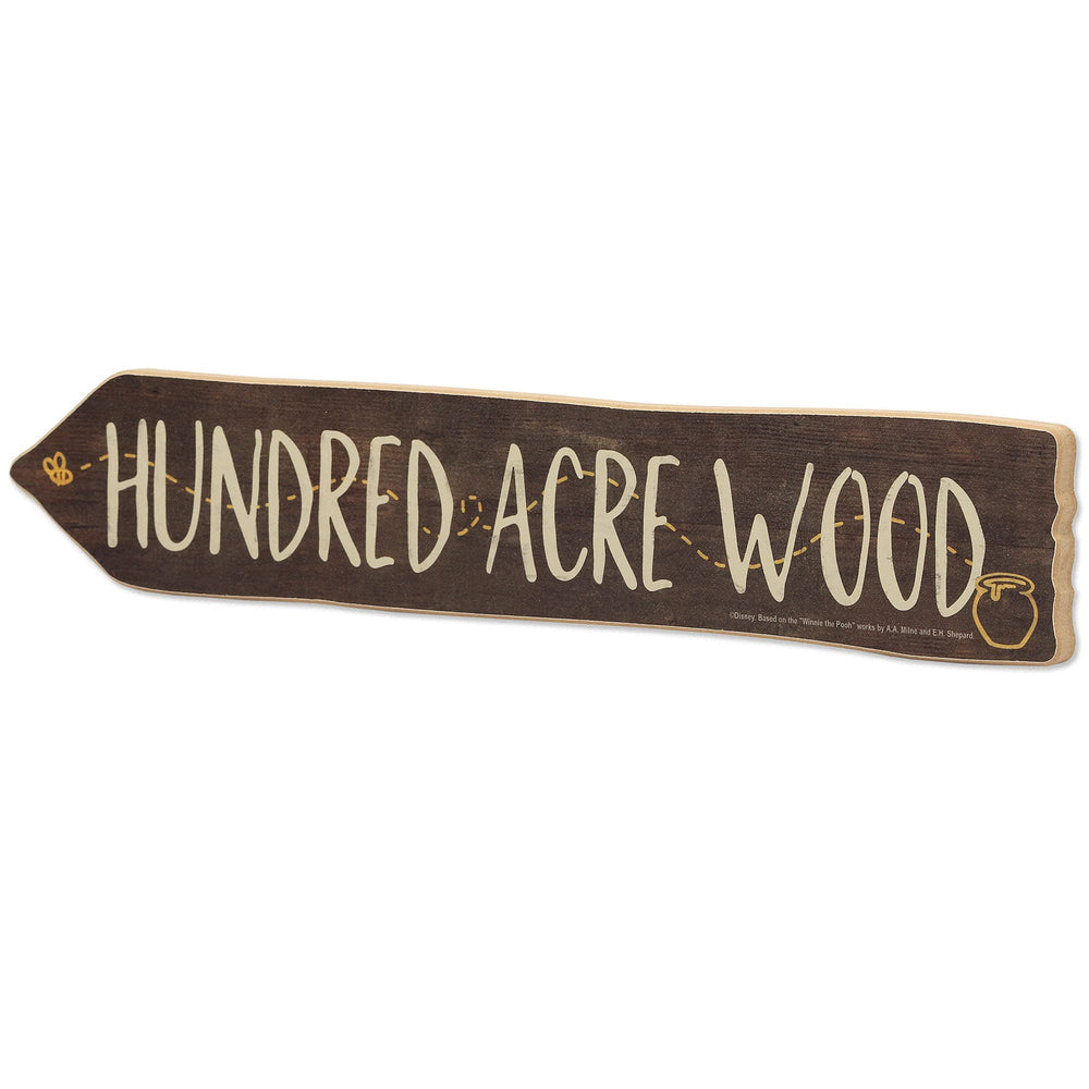 Open Road Brands Winnie the Pooh Hundred Acre Wood sign arrow close up showing aged charm.