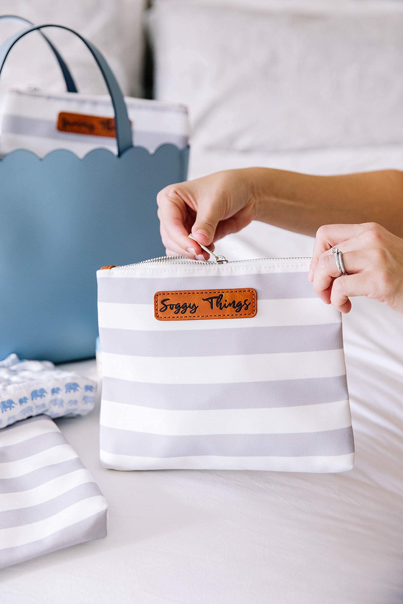Orange Blossom Mommy Things label stores essentials like phone and wipes