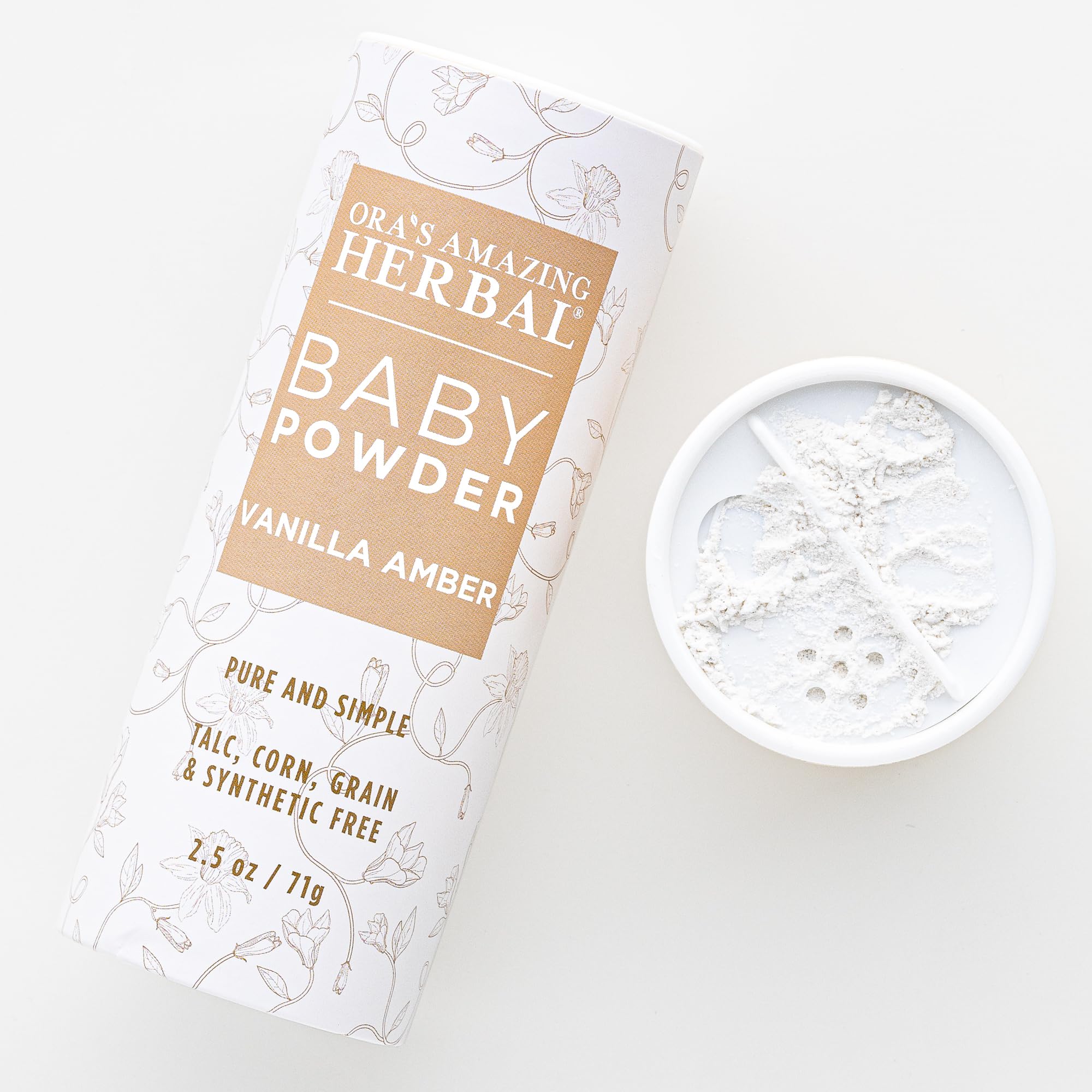 Ora's Amazing Herbal Baby Powder Vanilla Amber tub with soft texture for gentle daily use.