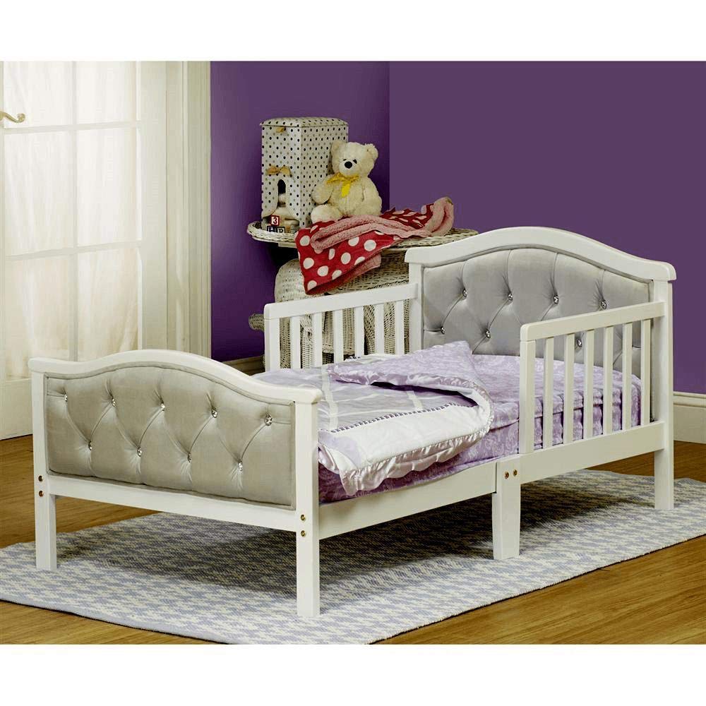 Orbelle Gray padded headboard with crystal-like buttons, adding whimsy and elegance.