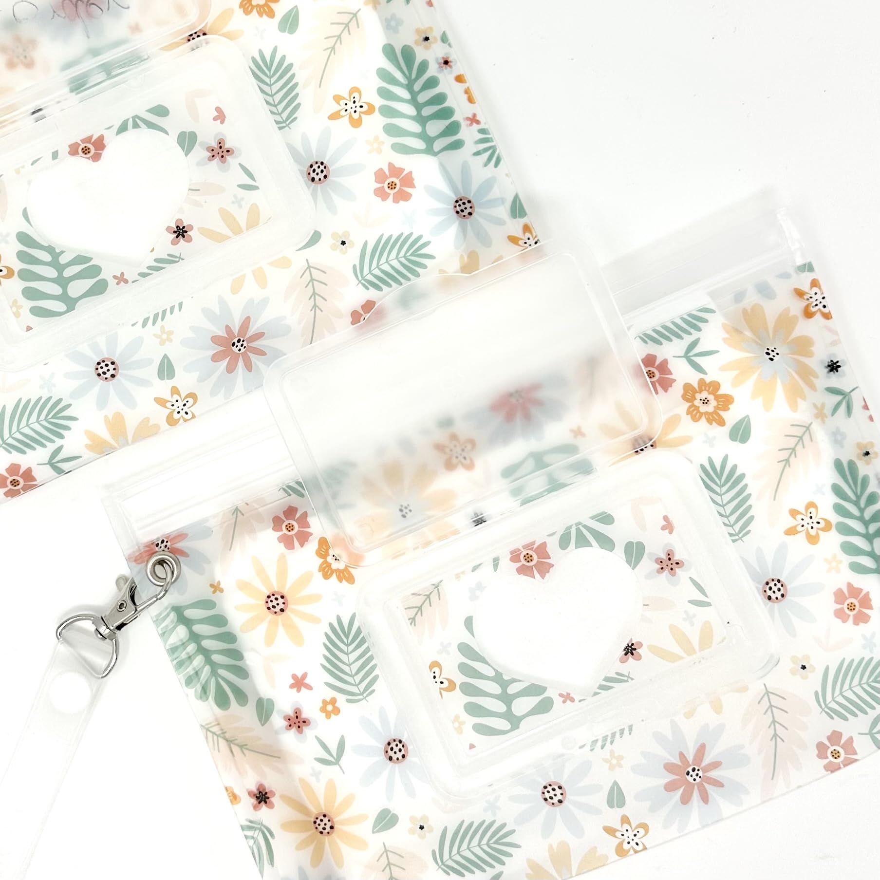 Orchid Hearts compact wipes dispenser for on-the-go diaper bag needs.