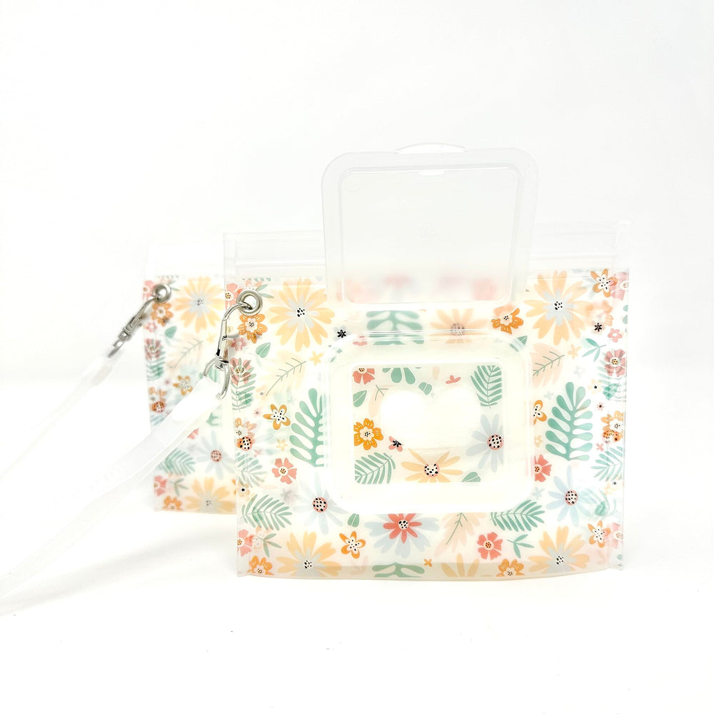 Orchid Hearts diaper bag essential for quick on-the-go cleanups.