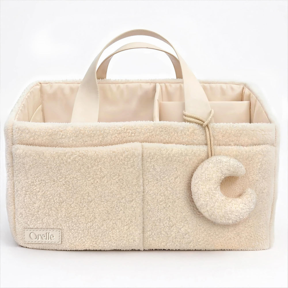 Orelle Bouclé Diaper Caddy Organizer with Handle keeps nursery organized and stylish.